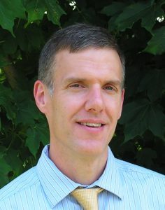 Portrait of Dr. Michael E. Jewett